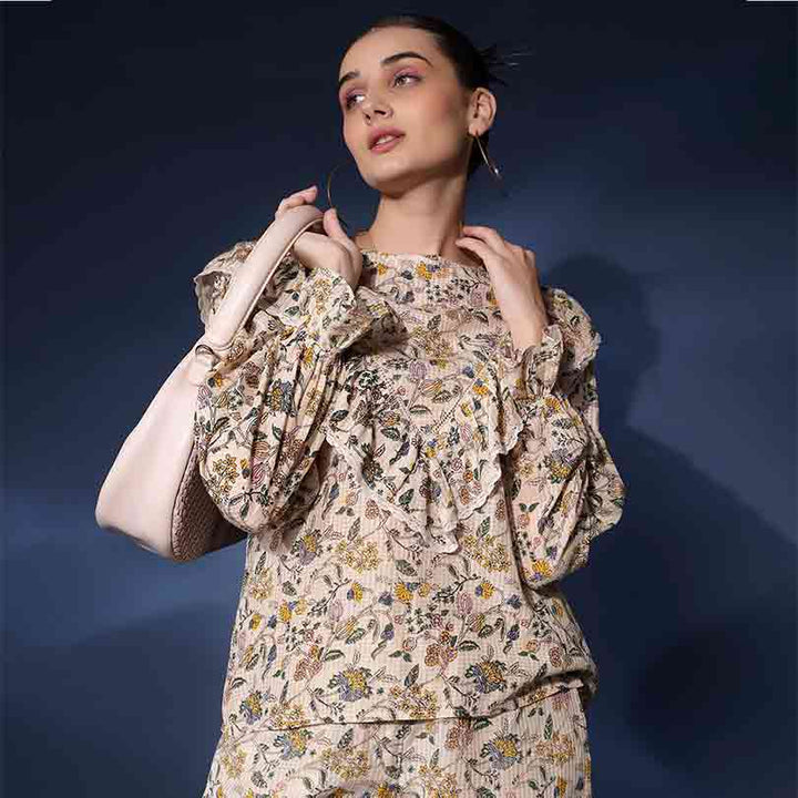 Saint Jasmaria ivory ruffle floral dobby top for women UK, front view styled with a shoulder bag.