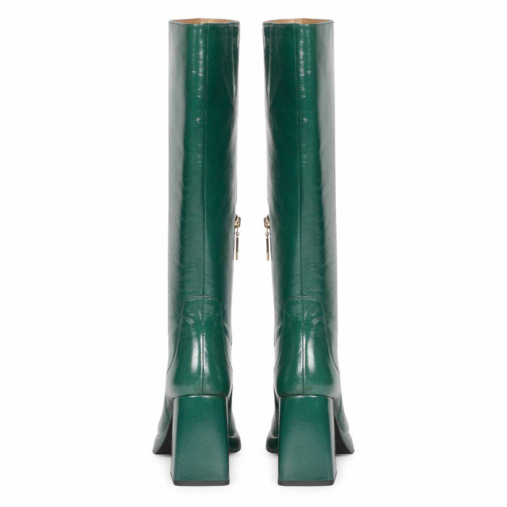 Saint Jolene green patent leather knee high boots, back pair view showing flared heel