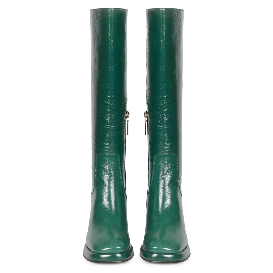 Women's green patent leather knee high boots, front pair view