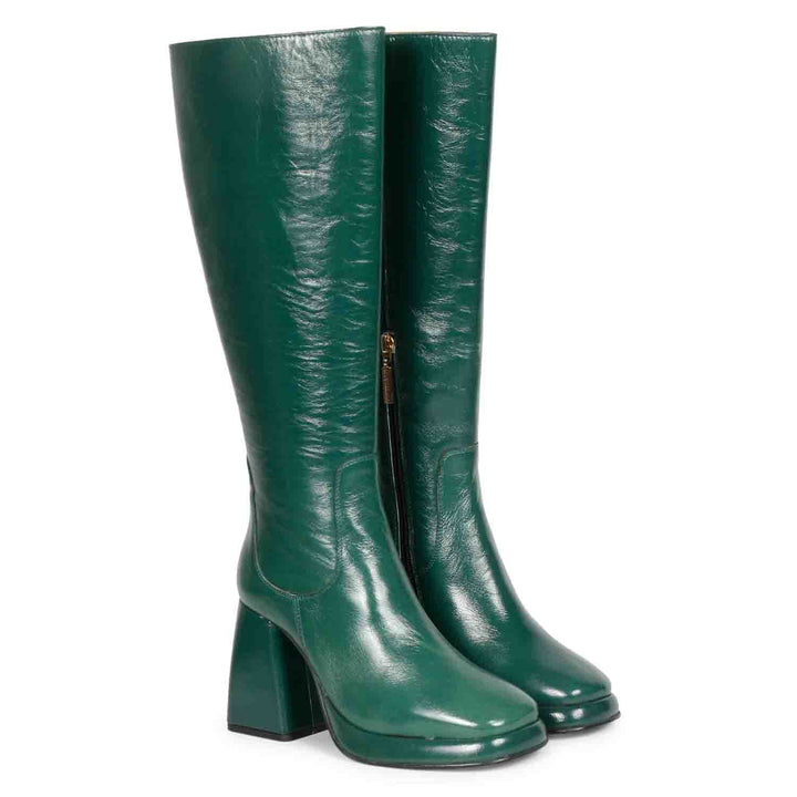 Green patent leather knee high boots for women UK, pair view showing platform sole