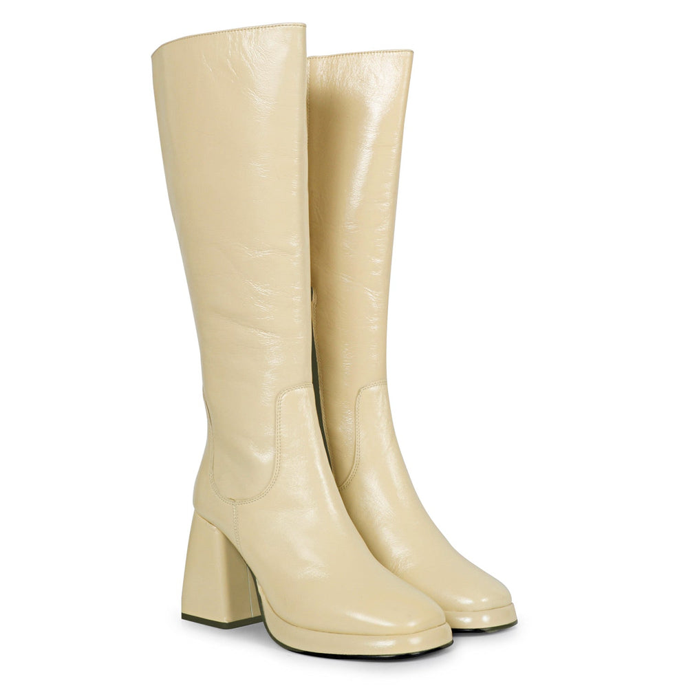 Off white patent leather knee high boots for women UK, pair view showing platform sole