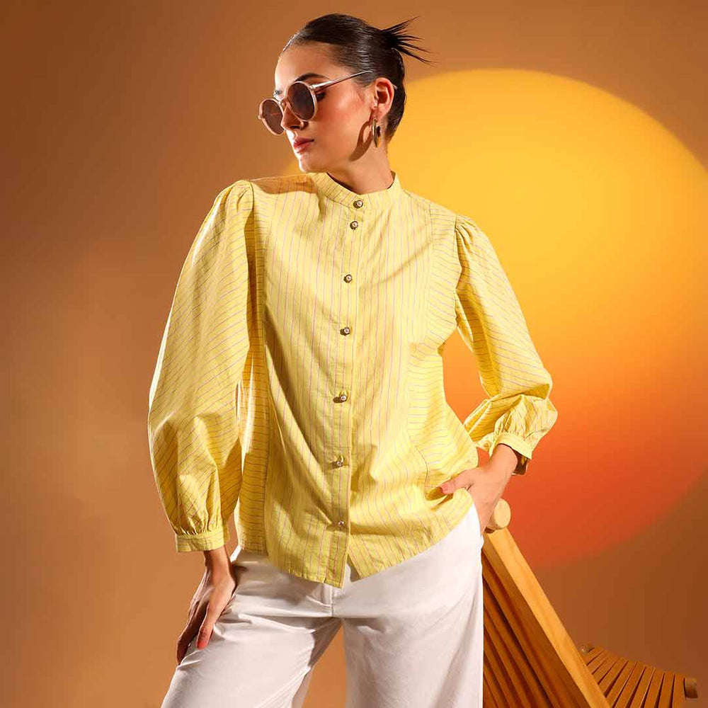 Women's amber stripe cotton shirt by Saint Kaeloryn, front view styled with wide-leg trousers.