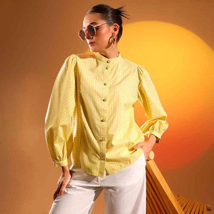Women's amber stripe cotton shirt by Saint Kaeloryn, front view styled with wide-leg trousers.