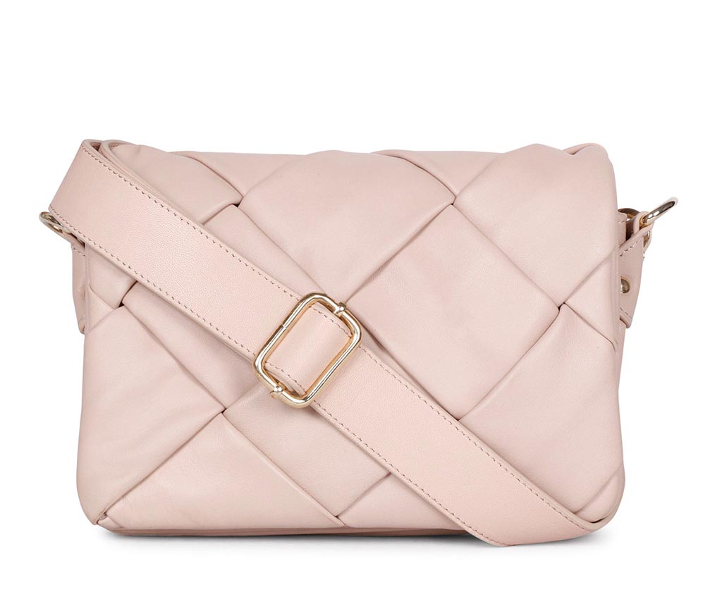 Saint Kate pink blush woven leather flap cross body bag for women UK, front view with wide strap and gold-tone buckle.