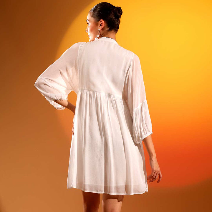 Women's white viscose crepe dress by Saint Kay, back view.