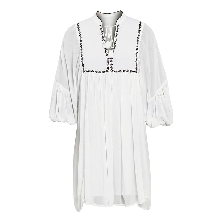 Saint Kay white viscose crepe dress for women UK, shown flat with embroidered yoke trim and tie neck.