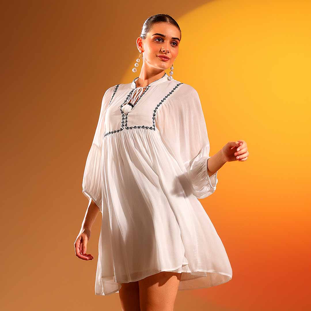 Saint Kay white viscose crepe dress for women UK, three-quarter front view.