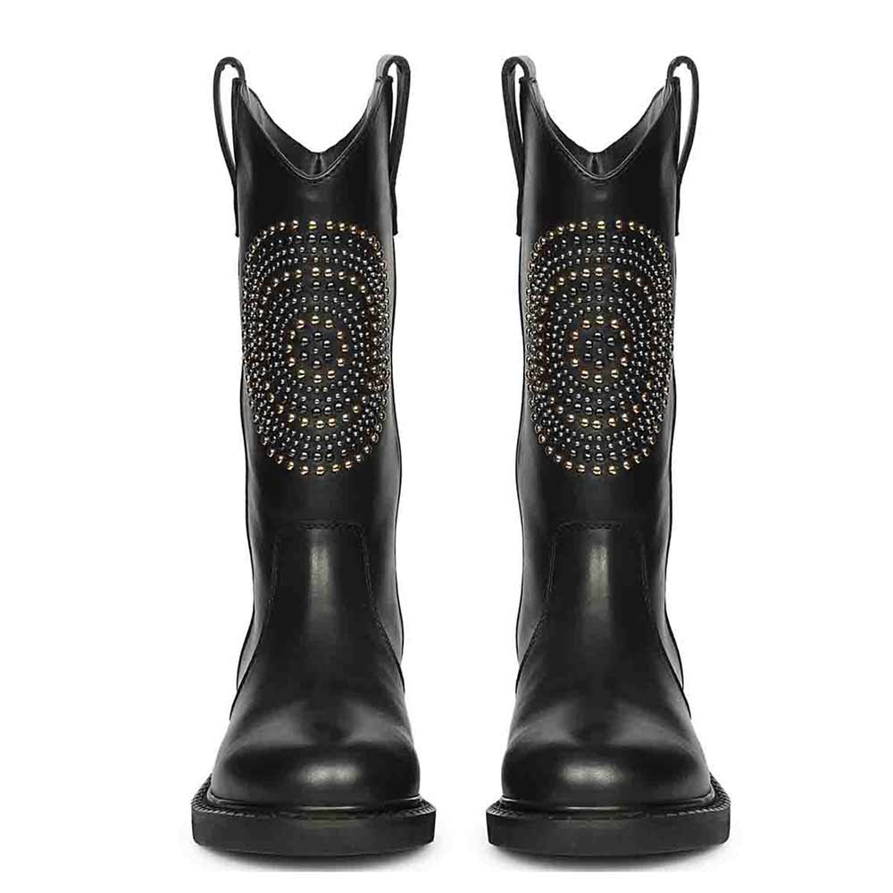 Saint Lilah studded black leather boots, front pair view showing pull tabs and stud medallion
