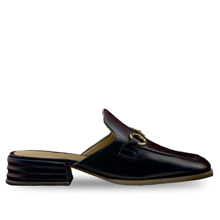 Best Saint Liona black leather mule, side profile view with gold horsebit — Women's backless shoes UK