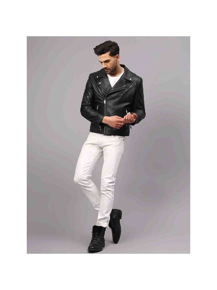 Full-length shot of a man wearing a black leather biker-style jacket.