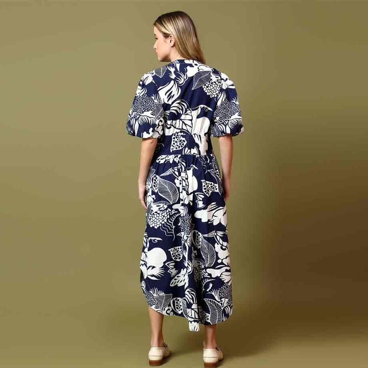 Women's navy white botanical print midi dress by Saint Louise, back view.