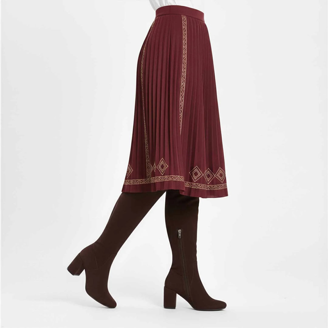 Women's brown suede thigh high boots UK by Saint Luisa, styled walking lifestyle shot