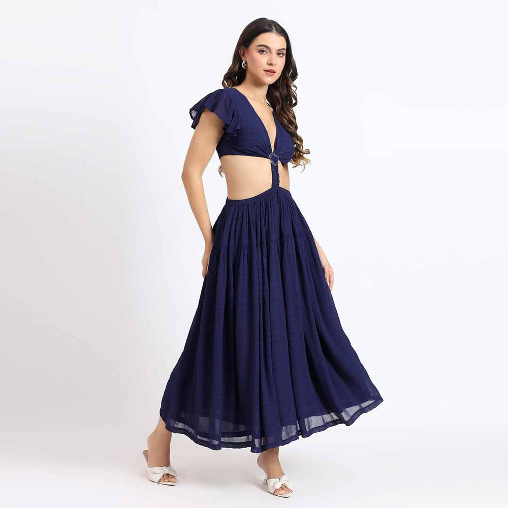 Close-up of the cutout waist detail on a navy blue maxi dress.