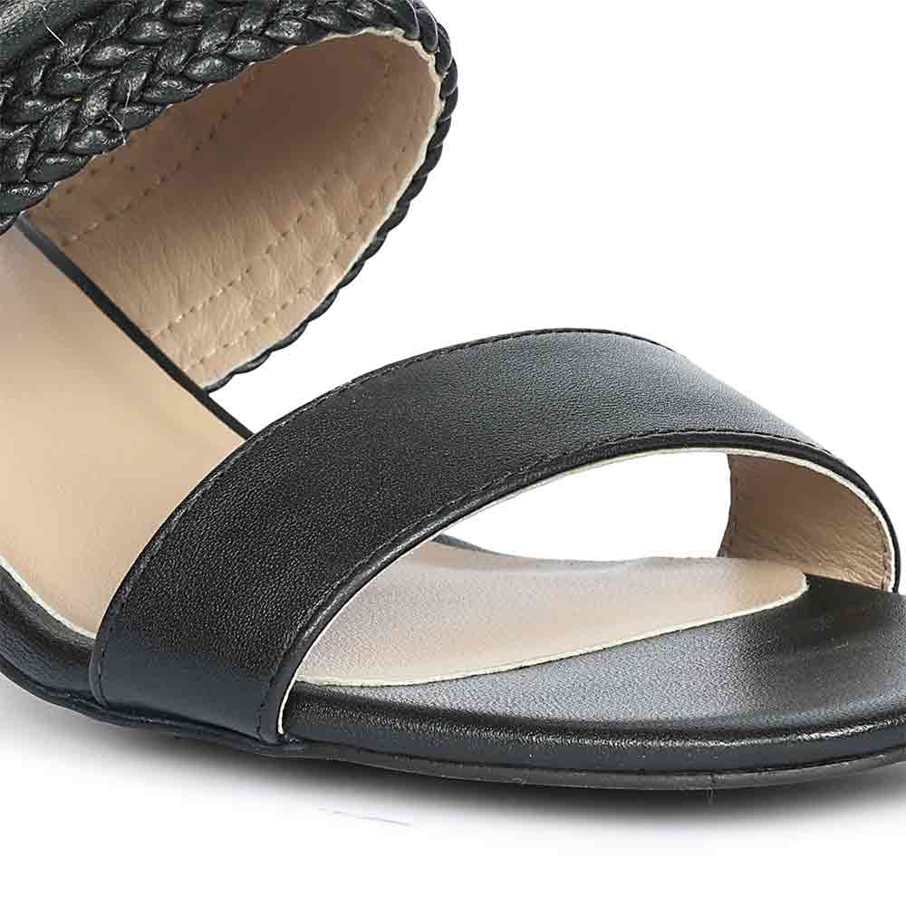 Close-up of hand-woven strap on Saint Mabel black leather low block heel sandals