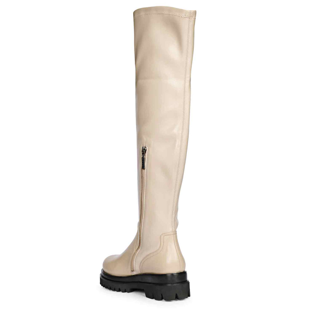 Saint Malia taupe thigh high boots, angled back view of lug sole