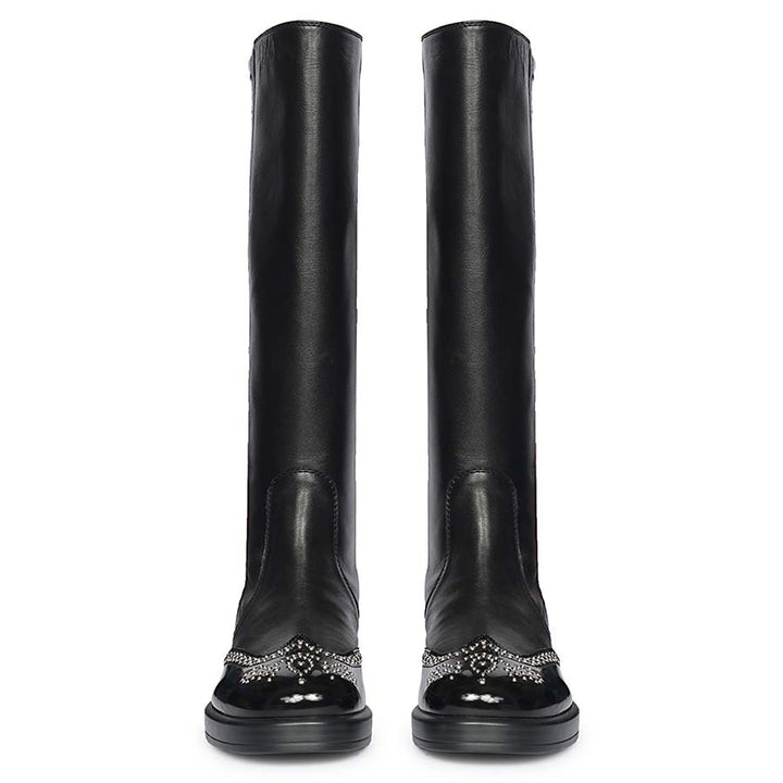 Women's black leather knee high boots, front pair view of crystal-studded toe cap