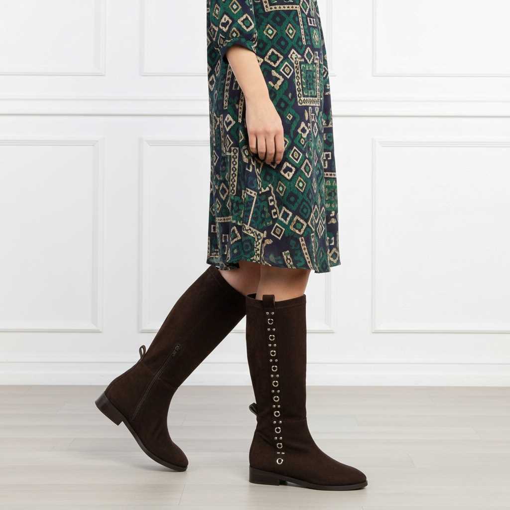 Women's Saint Marlowe brown suede long boots styled with a printed midi dress, lifestyle view