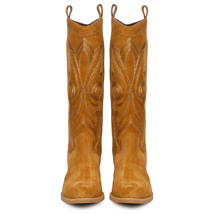Women's tan suede cowboy boots, front pair view of stitched embroidery