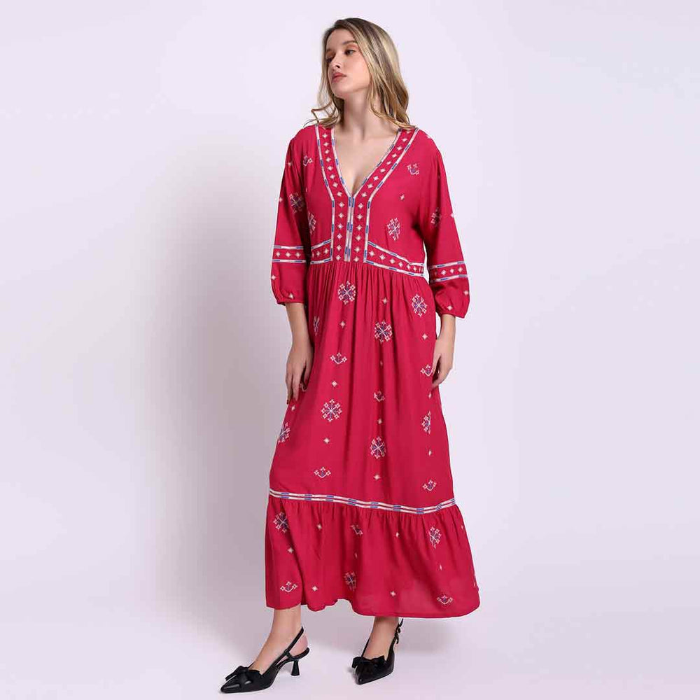 Women's red long dress by Saint Martine, three-quarter front view showing the tiered hem.