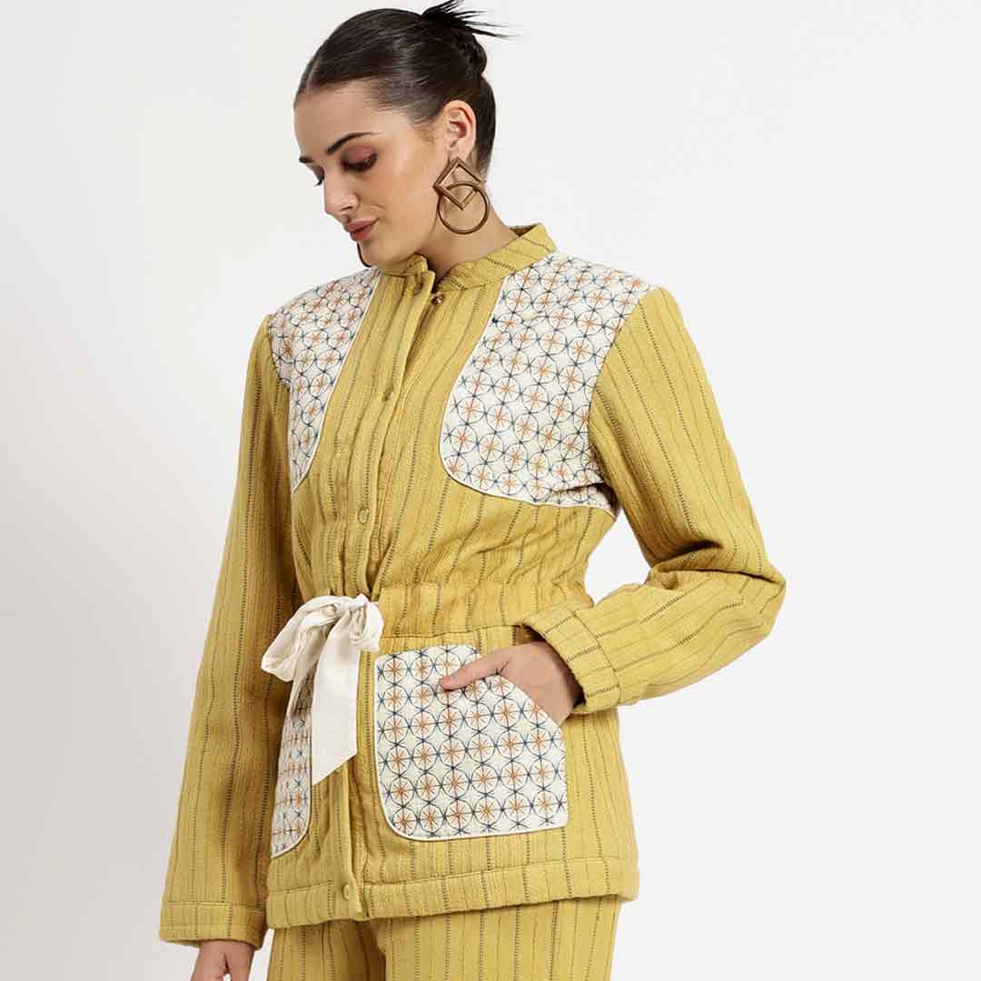 Women's yellow slub jacket by Saint Mazie, three-quarter front view.