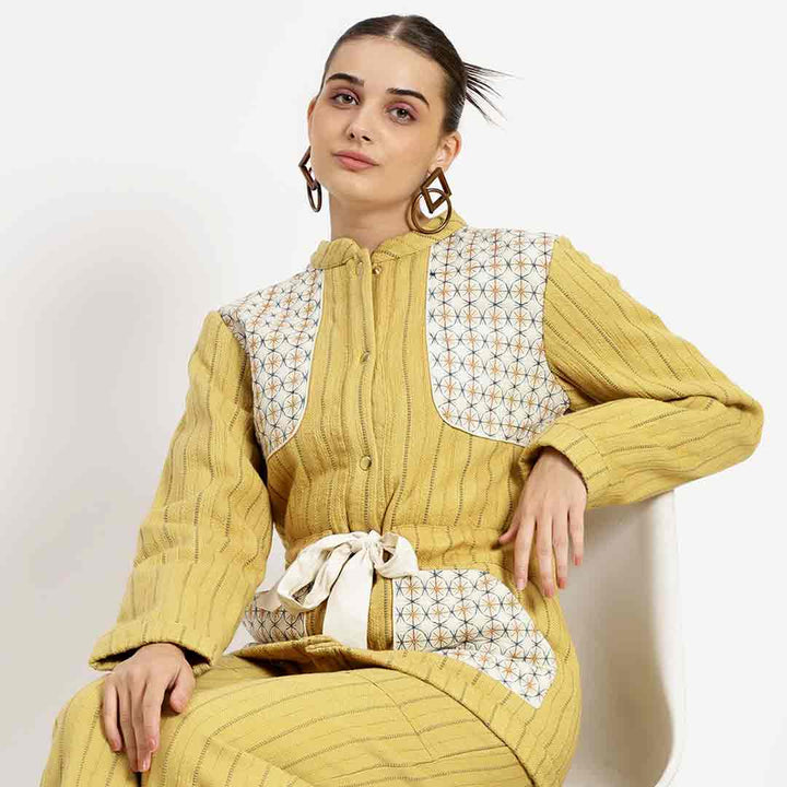 Women's yellow slub jacket by Saint Mazie, seated lifestyle view.