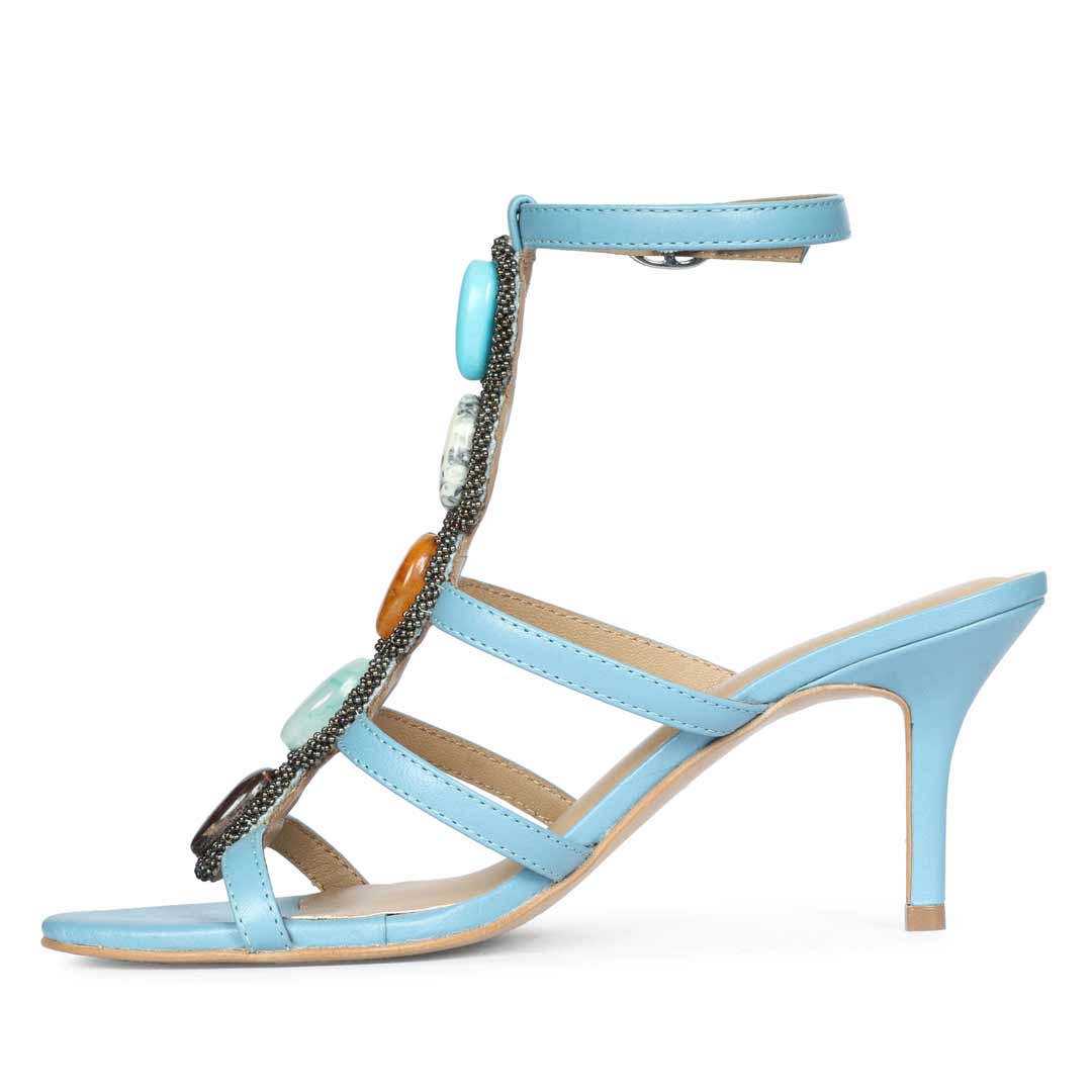 Saint Monroe multi stone embellished blue leather stilettos, angled view