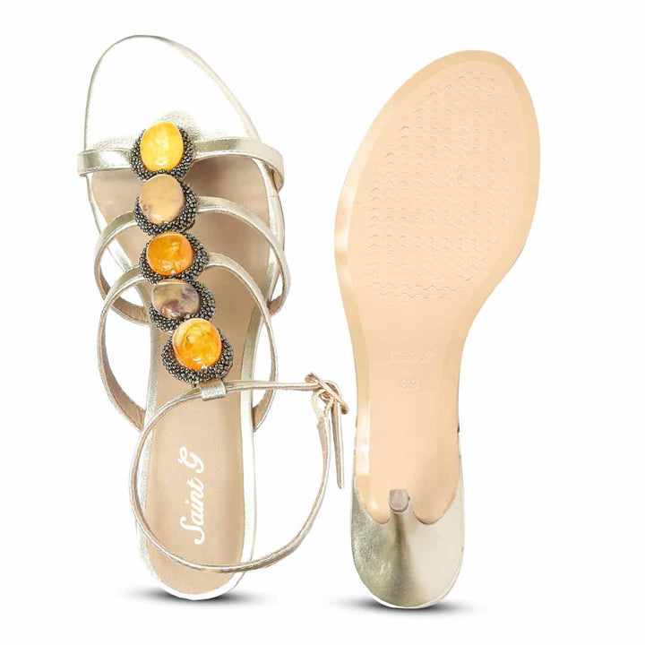 Saint Monroe multi stone embellished metallic gold leather stilettos, sole view