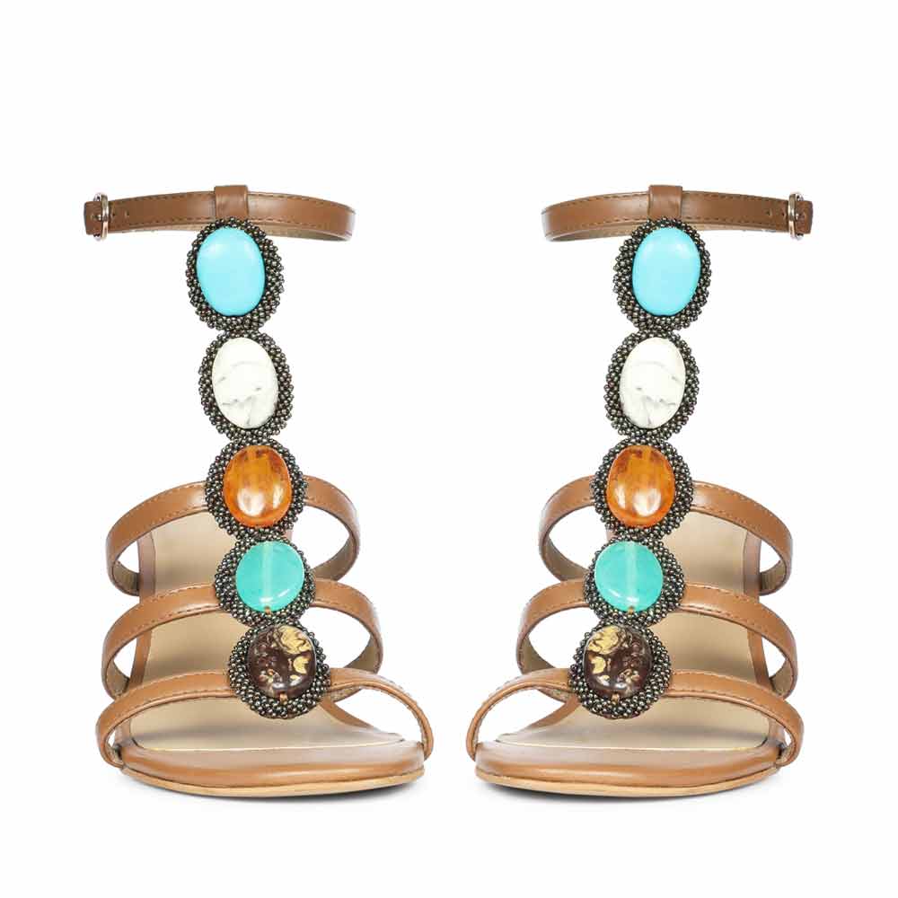 Saint Monroe tan leather stilettos, pair view showing multi stone embellishment