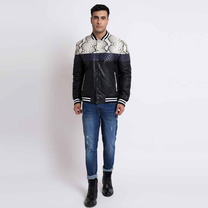 Full-length shot of a man wearing a colourblock python-print bomber jacket.