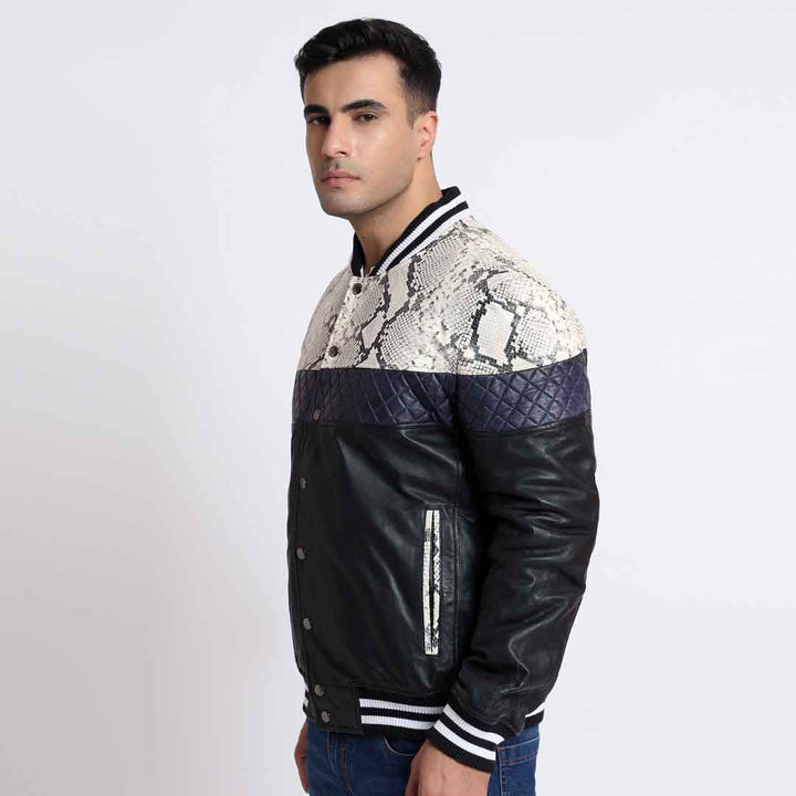 Side view of a colourblock bomber jacket with a python-print yoke and black leather body.