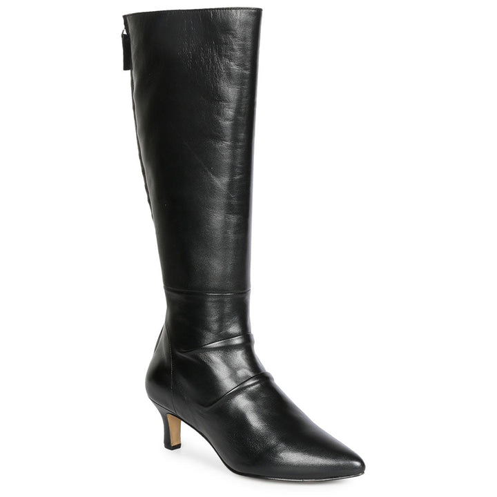 Close-up of slouchy leather texture on Saint Nadine black knee high boots