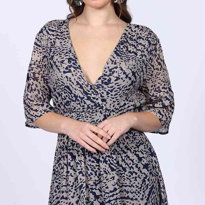 Close-up of kimono sleeve and tie waist on Saint navy abstract print viscose mini dress for women UK.