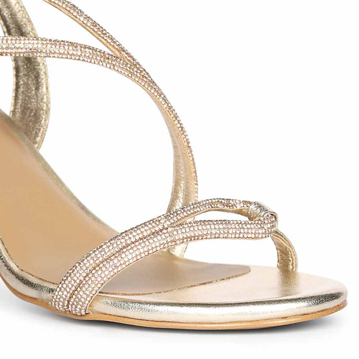 Close-up detail on Women's Saint Nessa Crystal Embellished Gold Leather Stilettos
