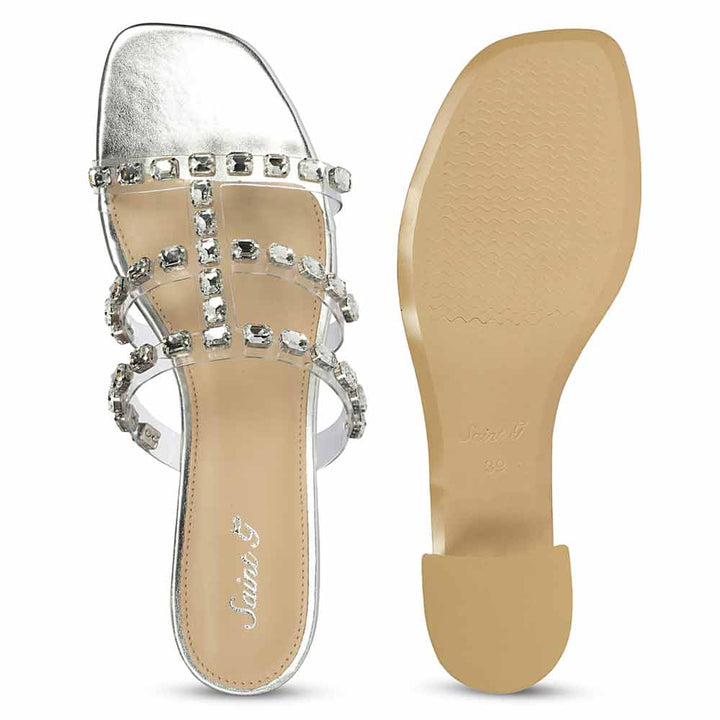 Silver low block heels for occasion wear – sole view