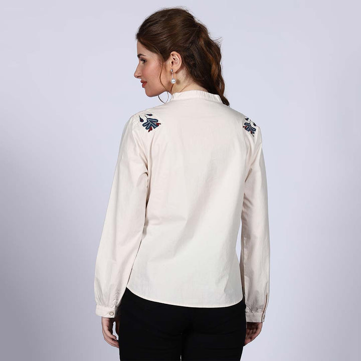 Women's off-white floral embroidered cotton top for women UK, back view with embroidered shoulder motifs.