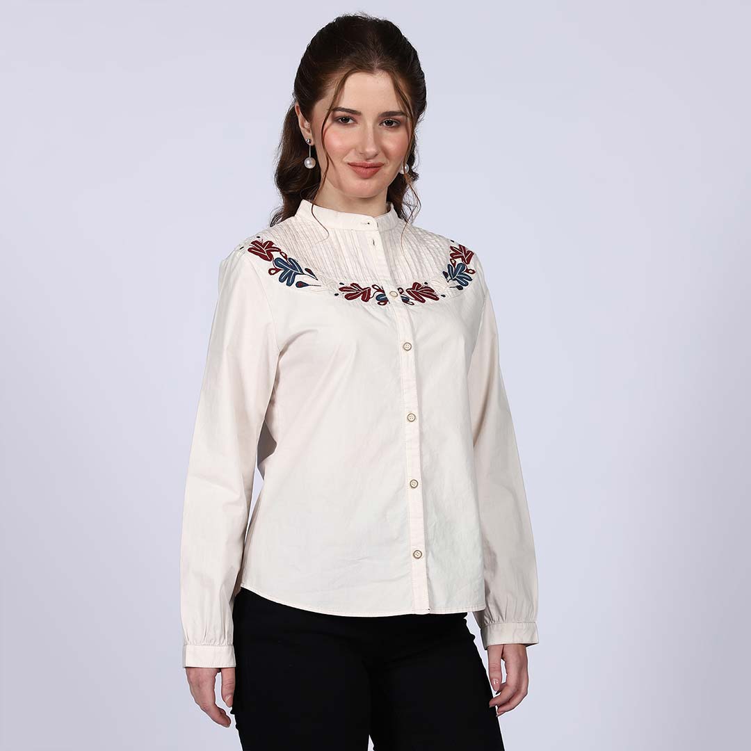 Saint off-white floral embroidered cotton top for women UK, front view showing pintuck yoke and button placket.