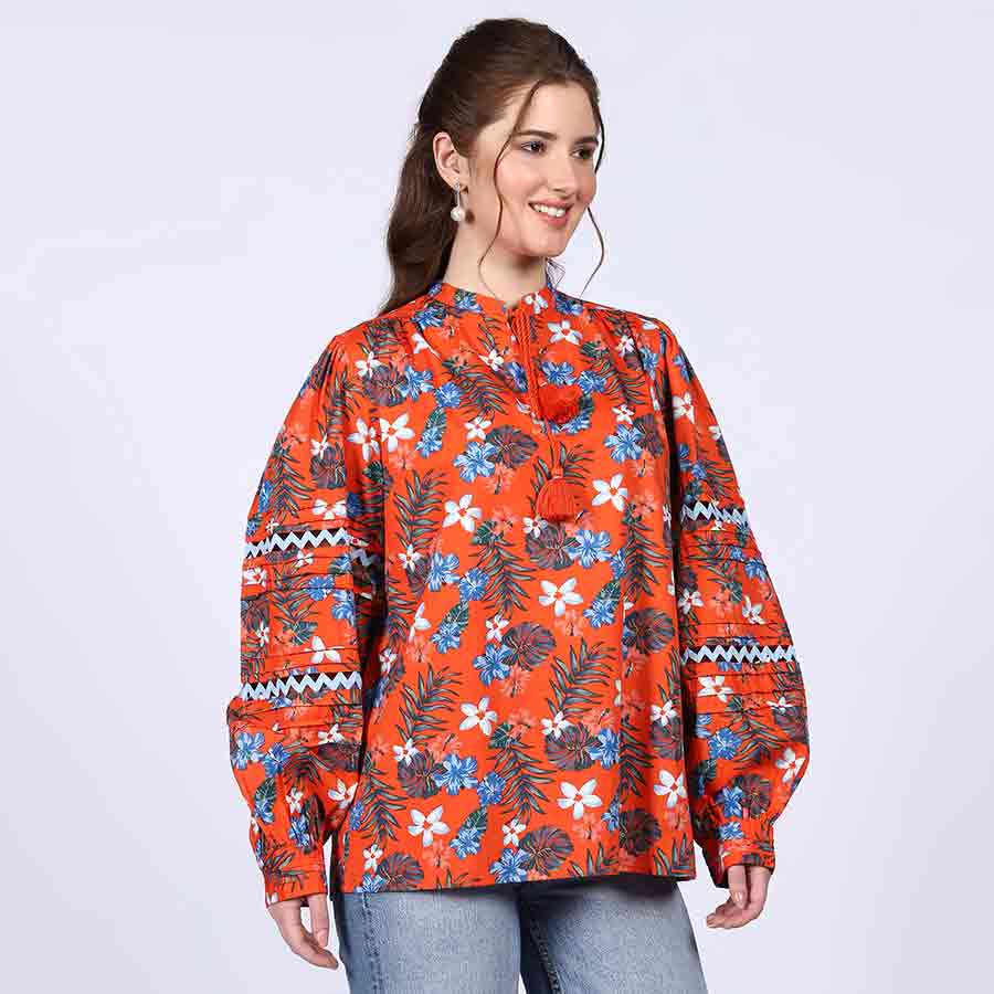 Saint orange multicolour floral cotton top for women UK, front view showing tasselled neck tie.