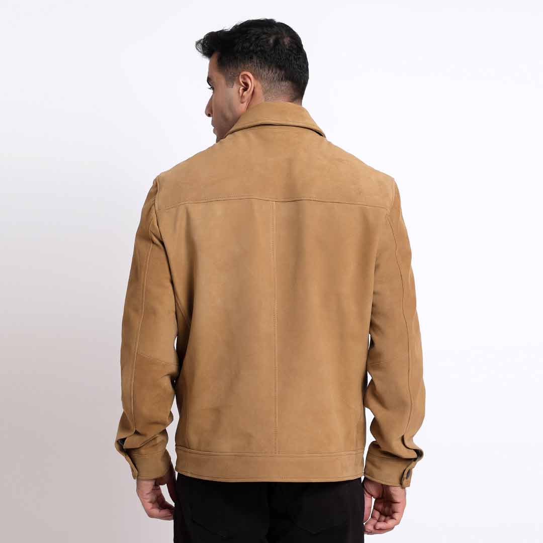 Back view of a man wearing a sand suede jacket.