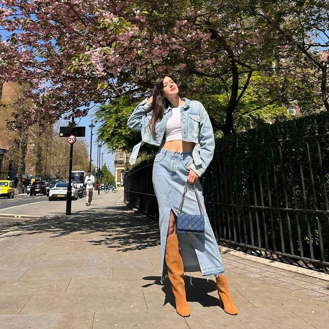 Women's tan suede slouch boots by Saint Priscilla, street-style lifestyle shot