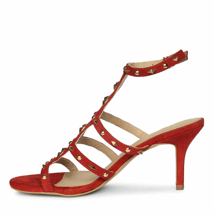 Saint Quenel Red Leather Studded Stilettos, angled view