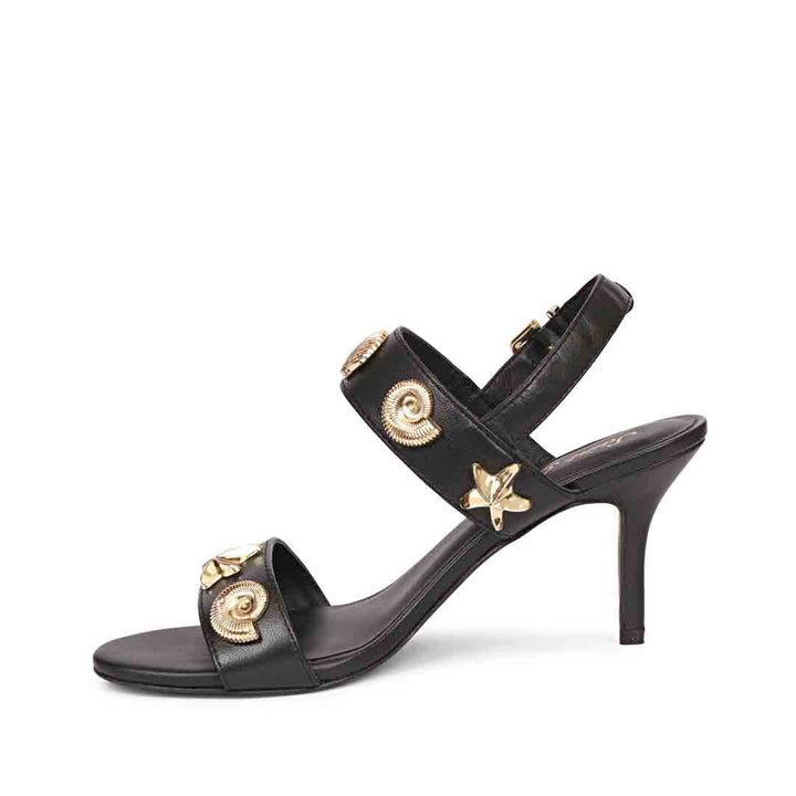 Women's Saint Ravena Seashell & Star Embellished Black Leather Stilettos, angled view