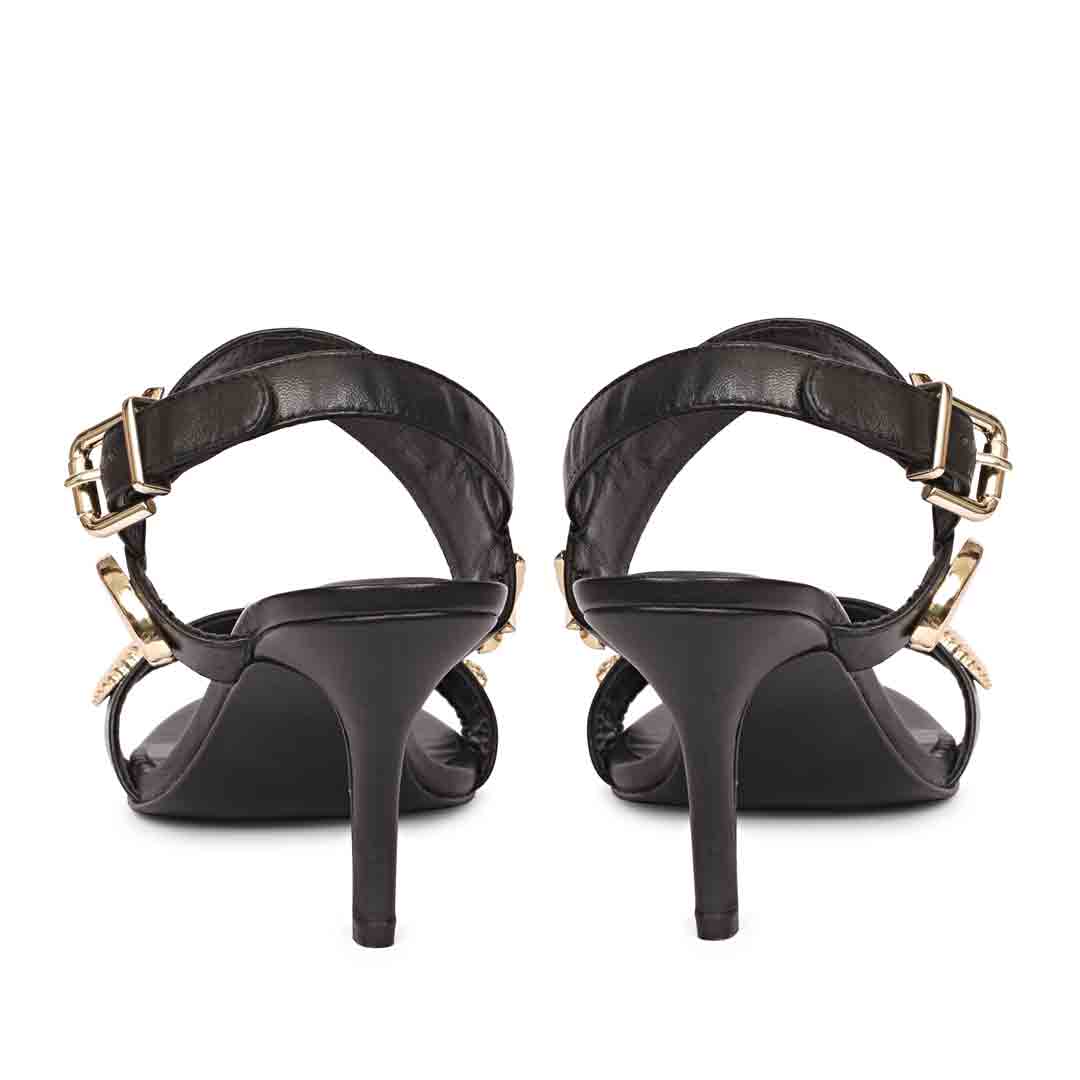 Women's Saint Ravena Seashell & Star Embellished Black Leather Stilettos, back pair view