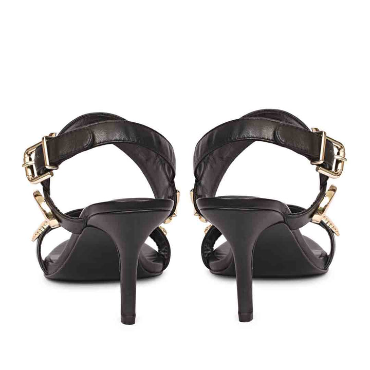Women's Saint Ravena Seashell & Star Embellished Black Leather Stilettos, back pair view