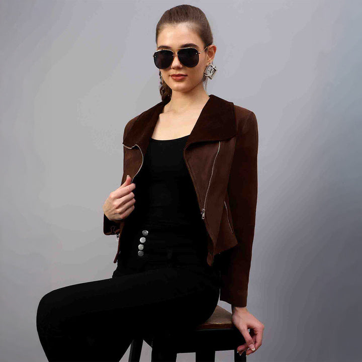 Women's brown suede jacket UK by Saint Rebecca, styled seated lifestyle shot