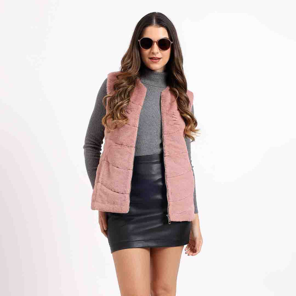 Women's dusty rose fur sleeveless vest UK by Saint Renata, styled lifestyle shot with sunglasses