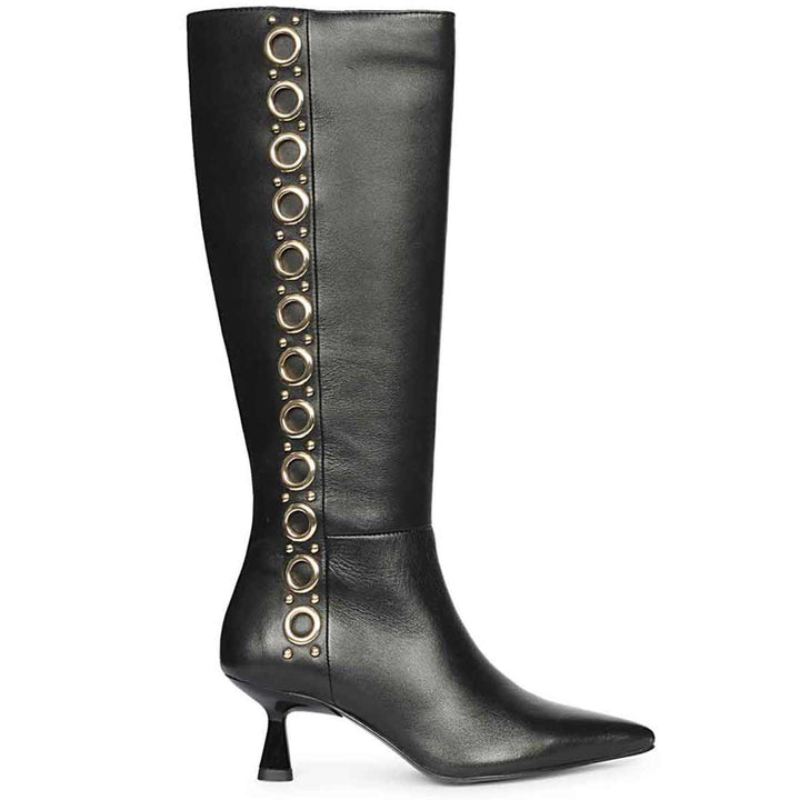Saint Sadie gold eyelet black leather knee high boots for women, side view of grommet trim