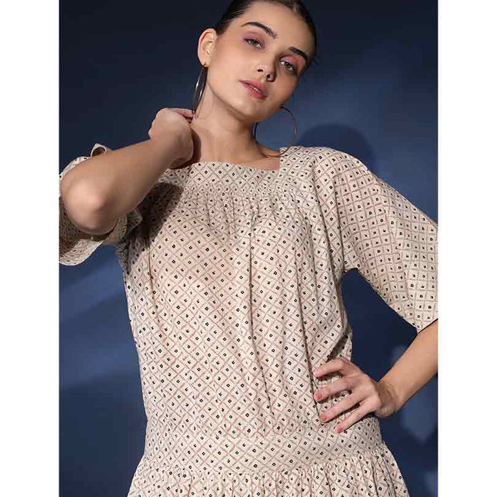 Close-up of square neckline and smocked bodice on Saint Saelora ivory diamond-print cotton short dress for women UK.