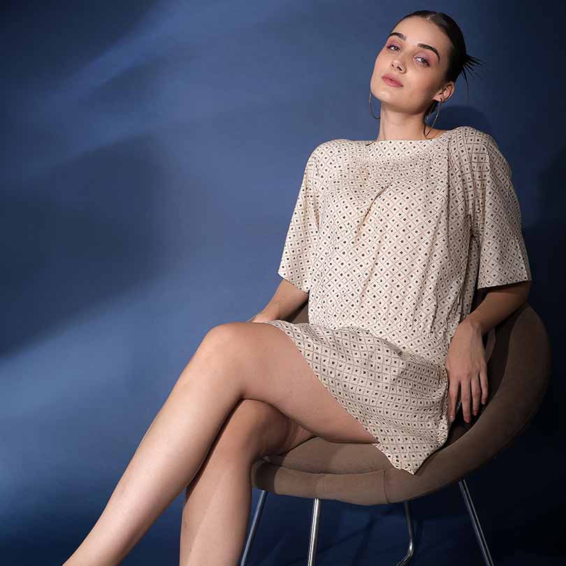 Saint Saelora ivory diamond-print cotton cambric short dress for women UK, seated view.