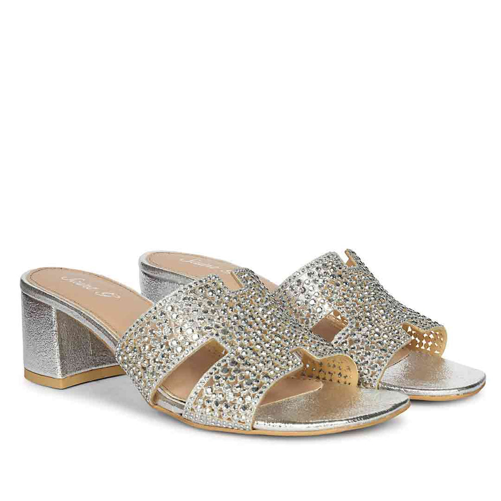 Low block heel mules silver crystal perforated leather – pair angle view