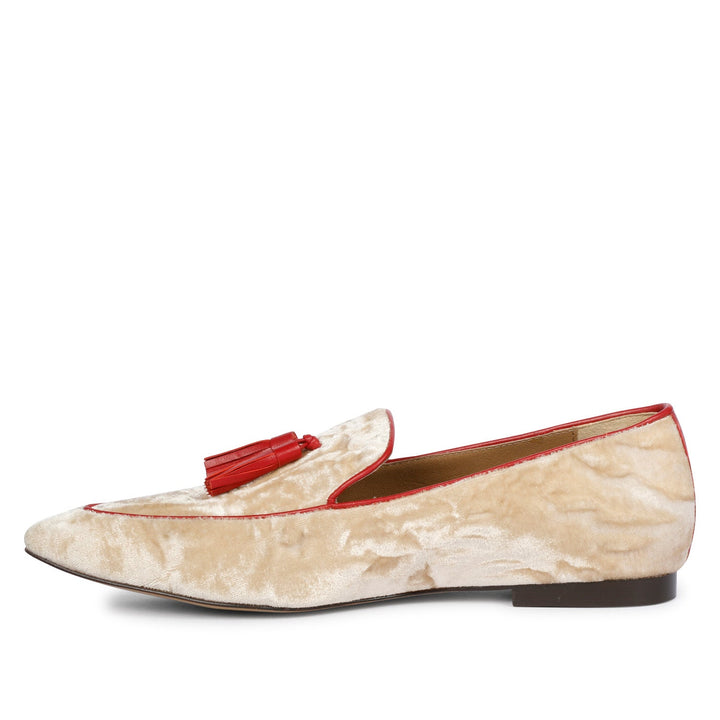 Ladies cream velvet tassel loafer moccasins with red trim, best women's side angle view, UK